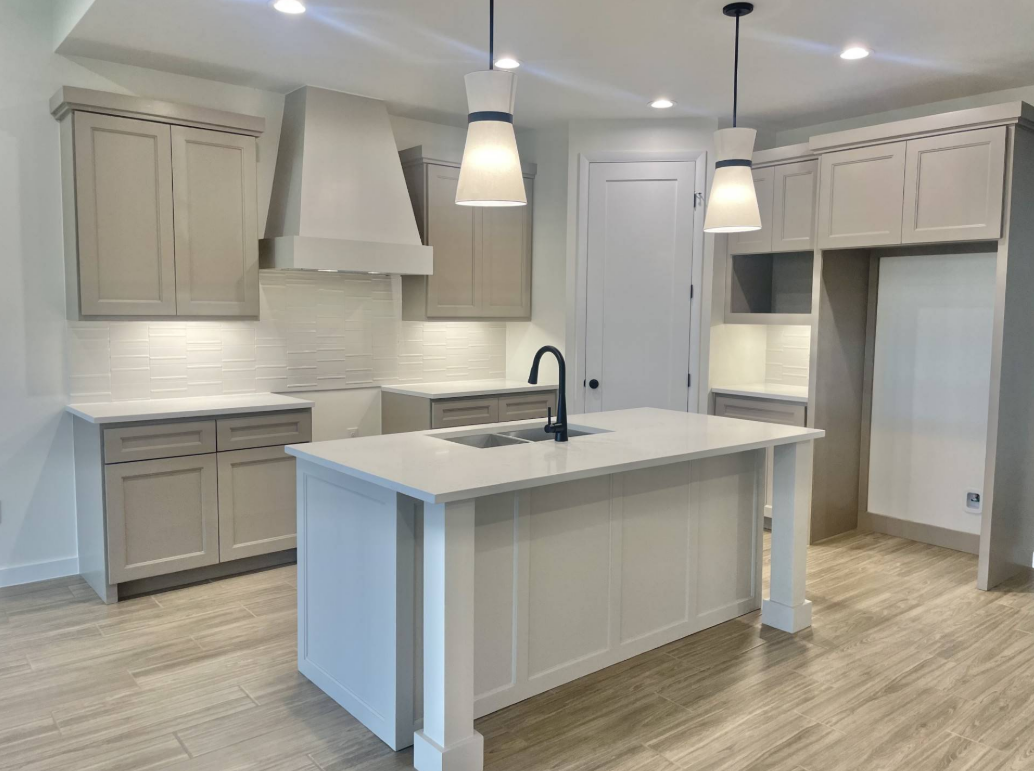 The kitchen and island of a home built in Antlers Crossing built by BB Homes.