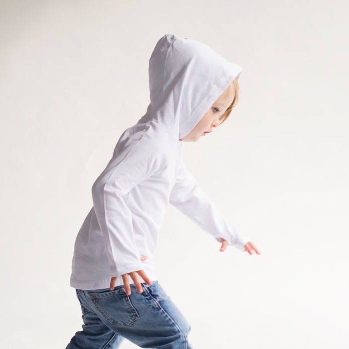 Toddler wearing a white hoodie