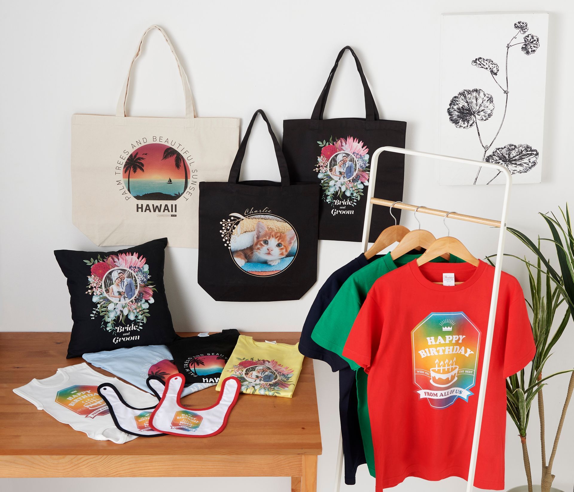 custom print examples on tote bags, t-shirts, cushions, bibs.