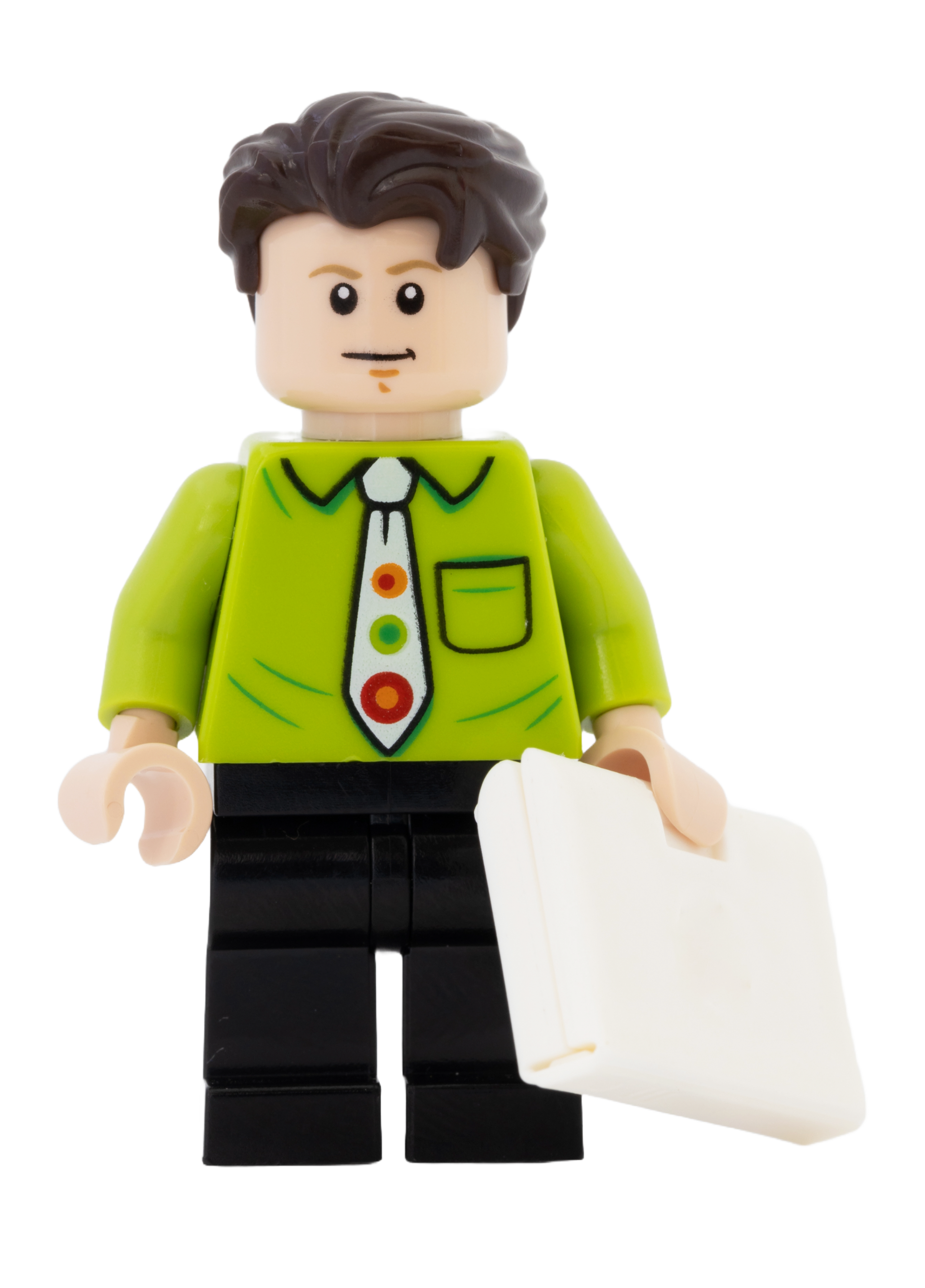 lego figure with green top, tie and black legs