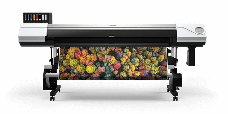 Roland DG UV printer with example of UV print on take up roll