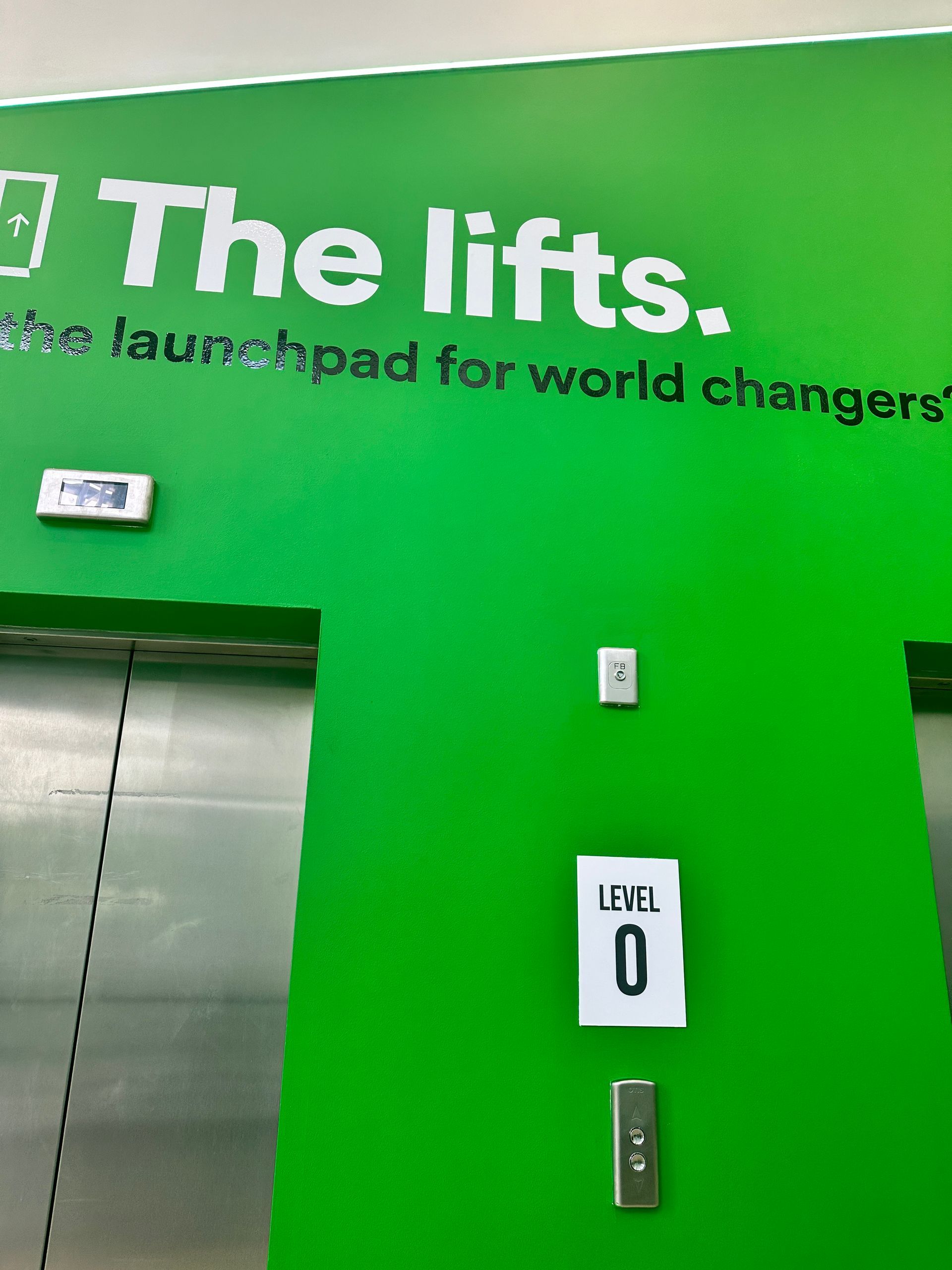 Ovo Energy brand refresh, internal and external signage