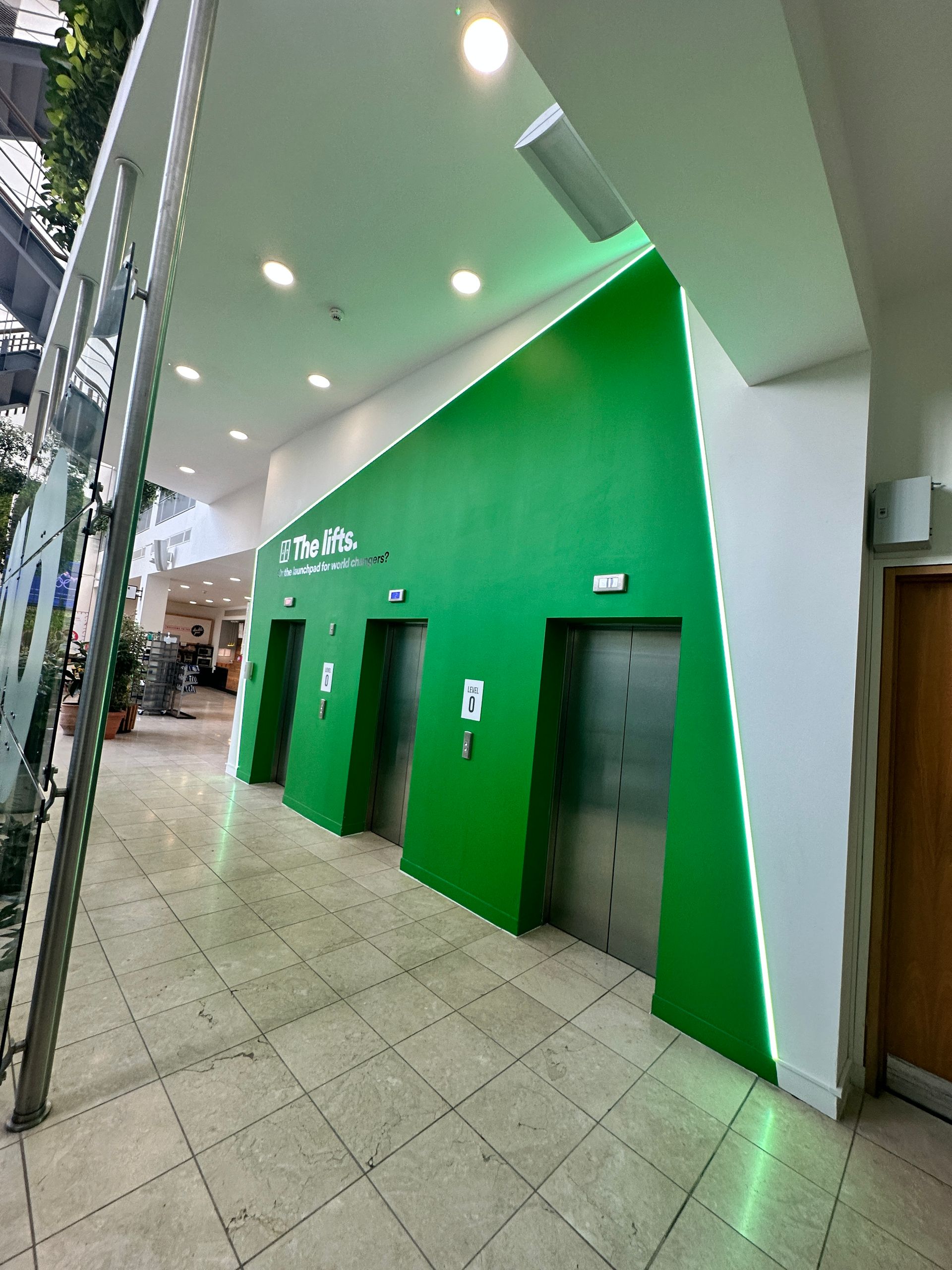 Ovo Energy brand refresh, internal and external signage