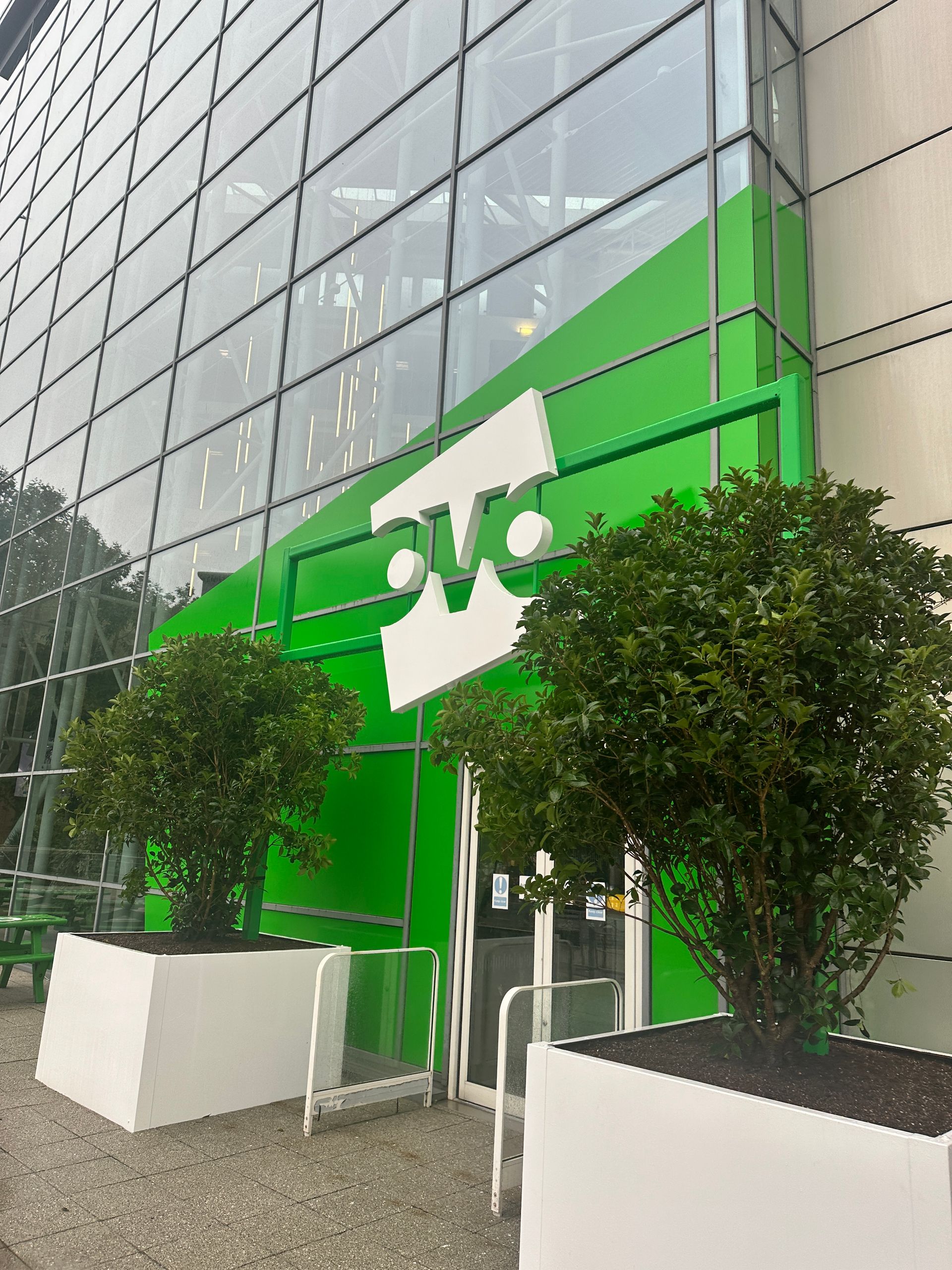 Ovo Energy brand refresh, internal and external signage