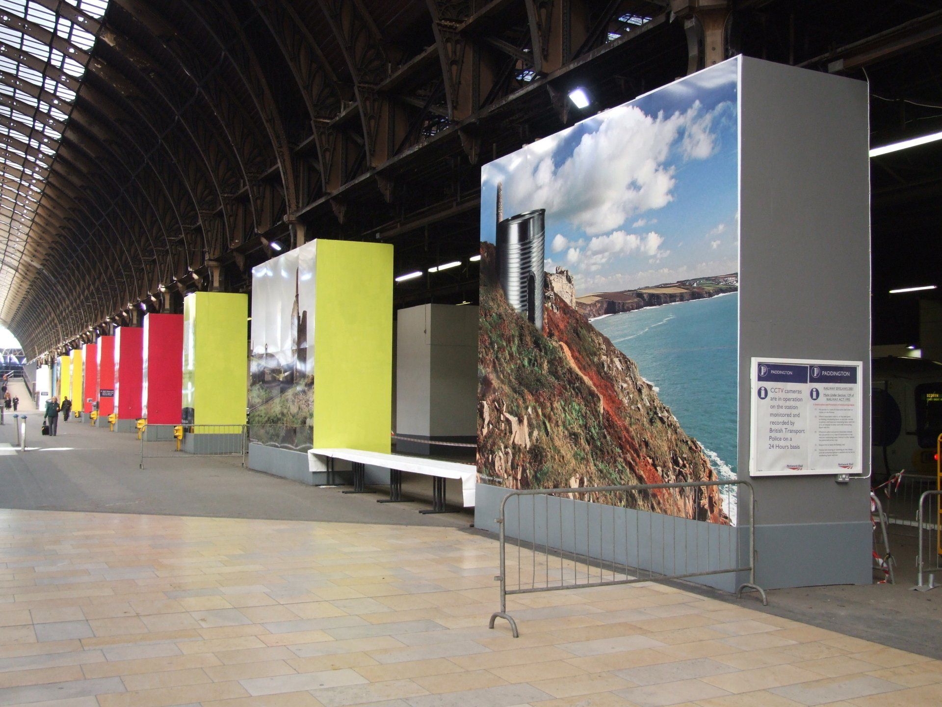 A large wall with a picture of a cliff on it