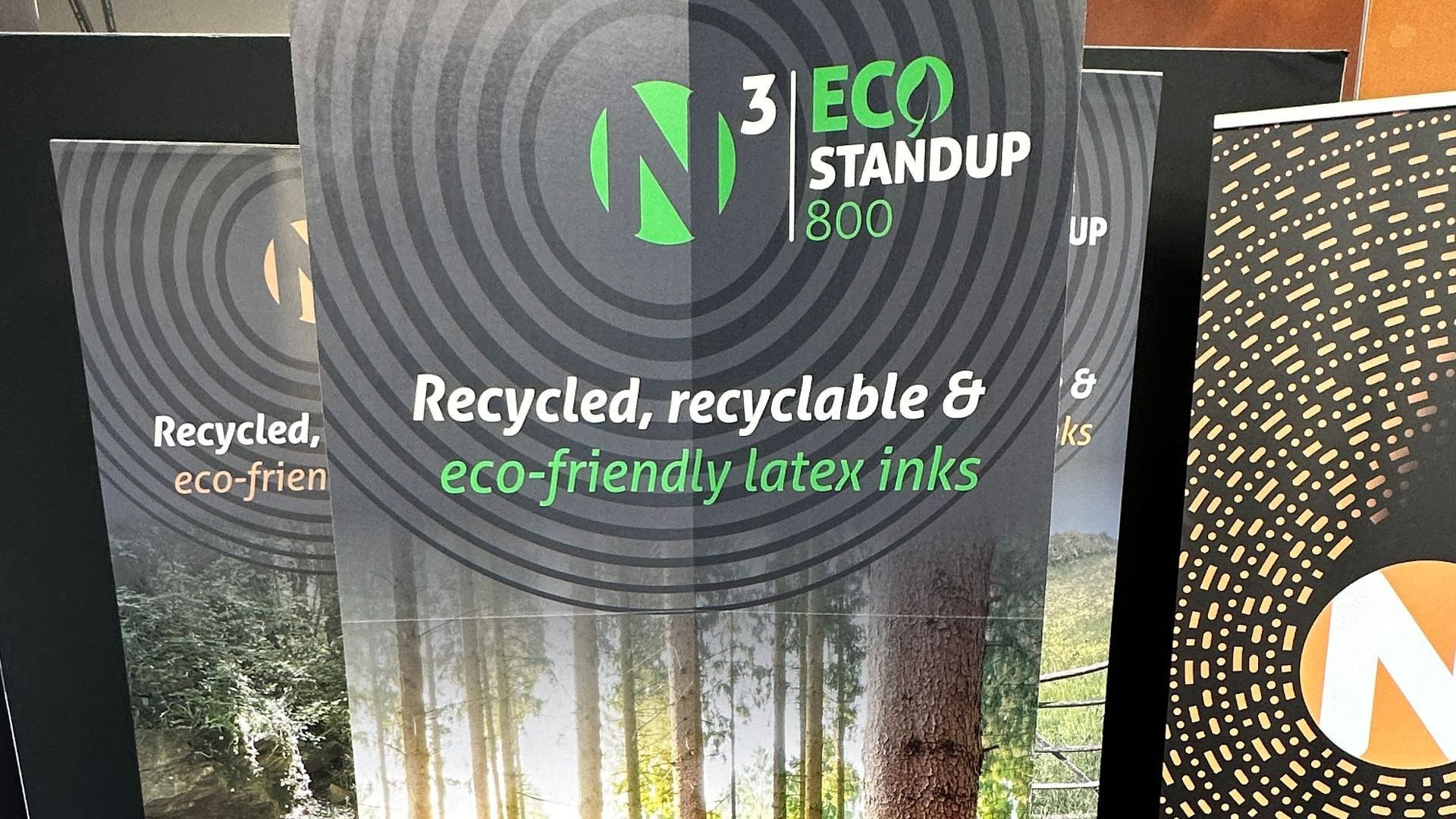A book that says recycled recyclable and eco-friendly latex inks