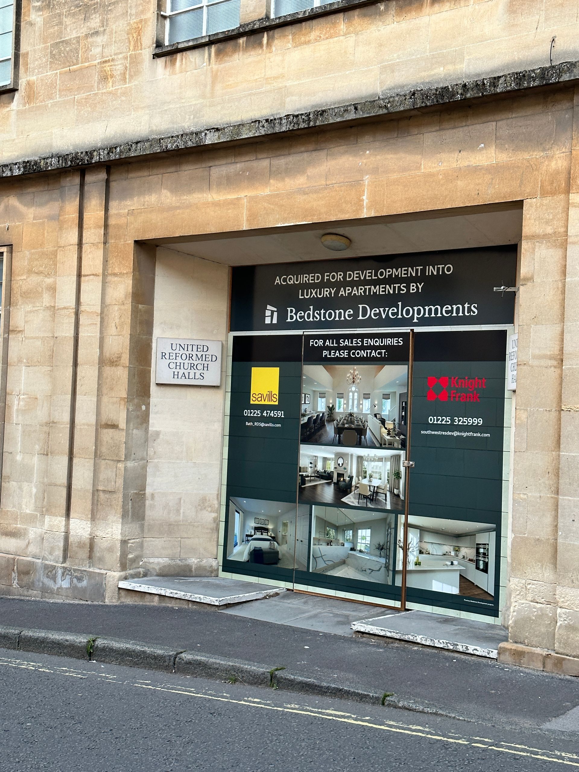 A building with a sign that says ' a boutique hotel ' on it