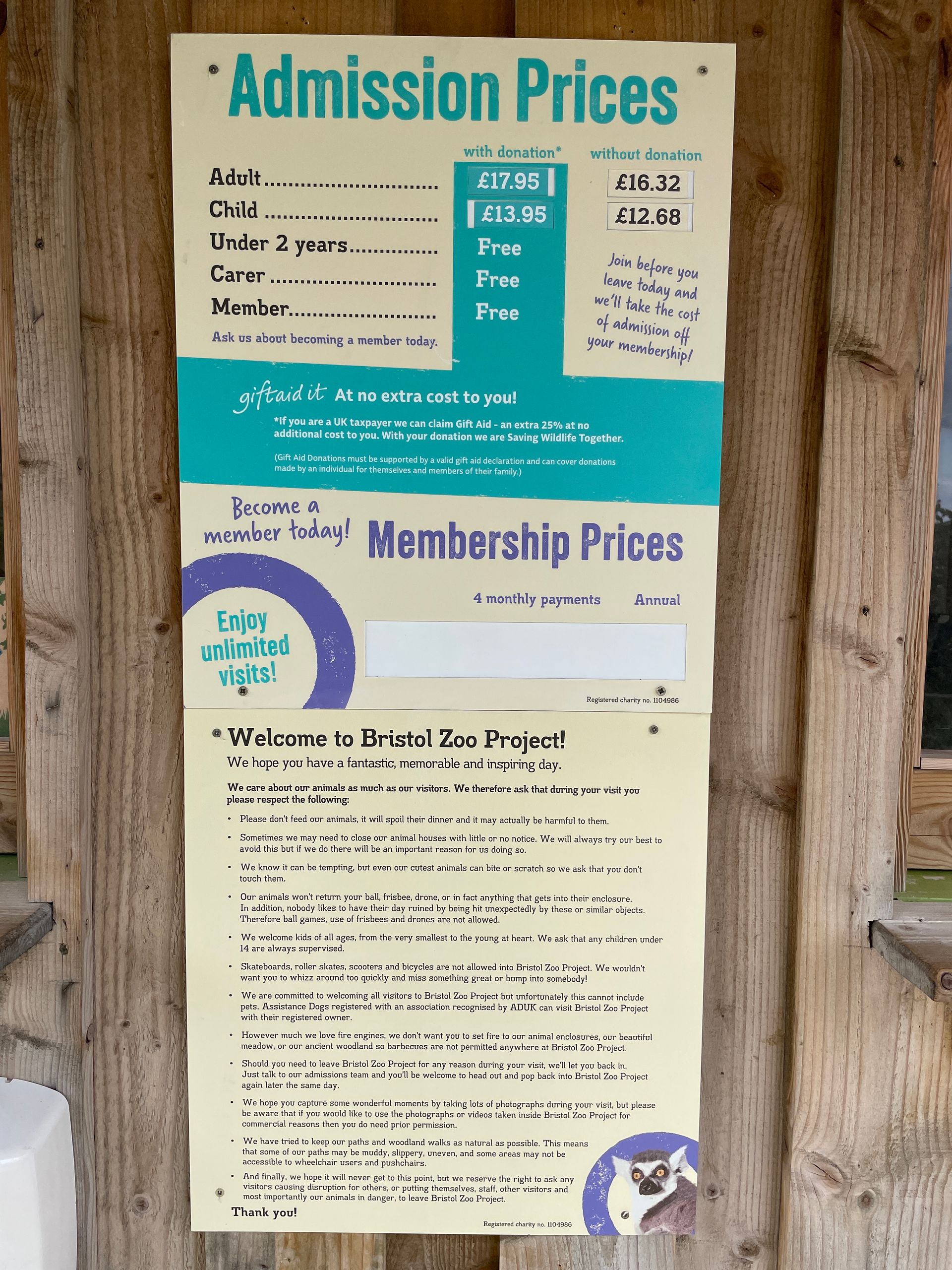 A sign that says admission prices on it