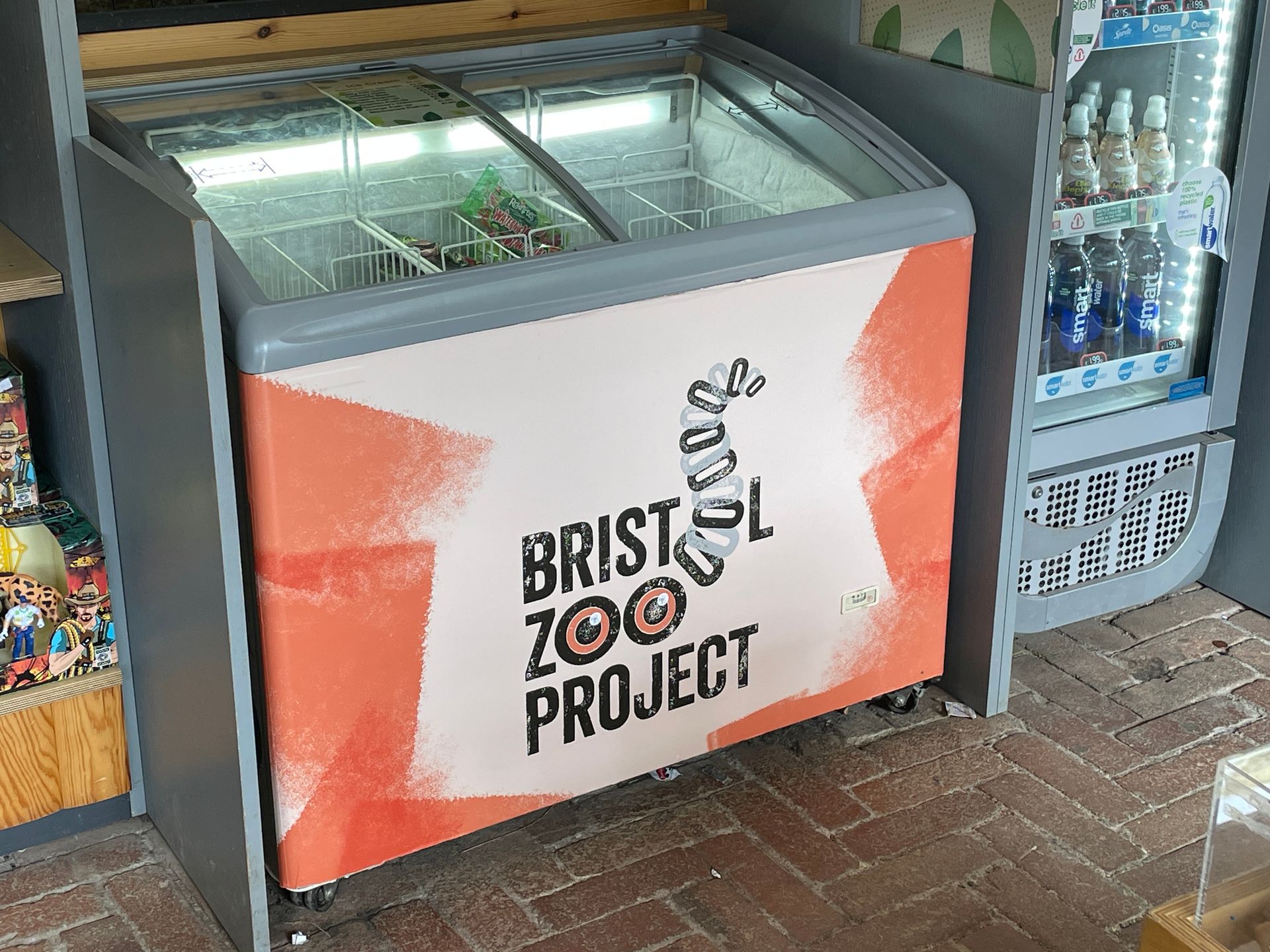 A freezer with a bristol zoo project sticker on it