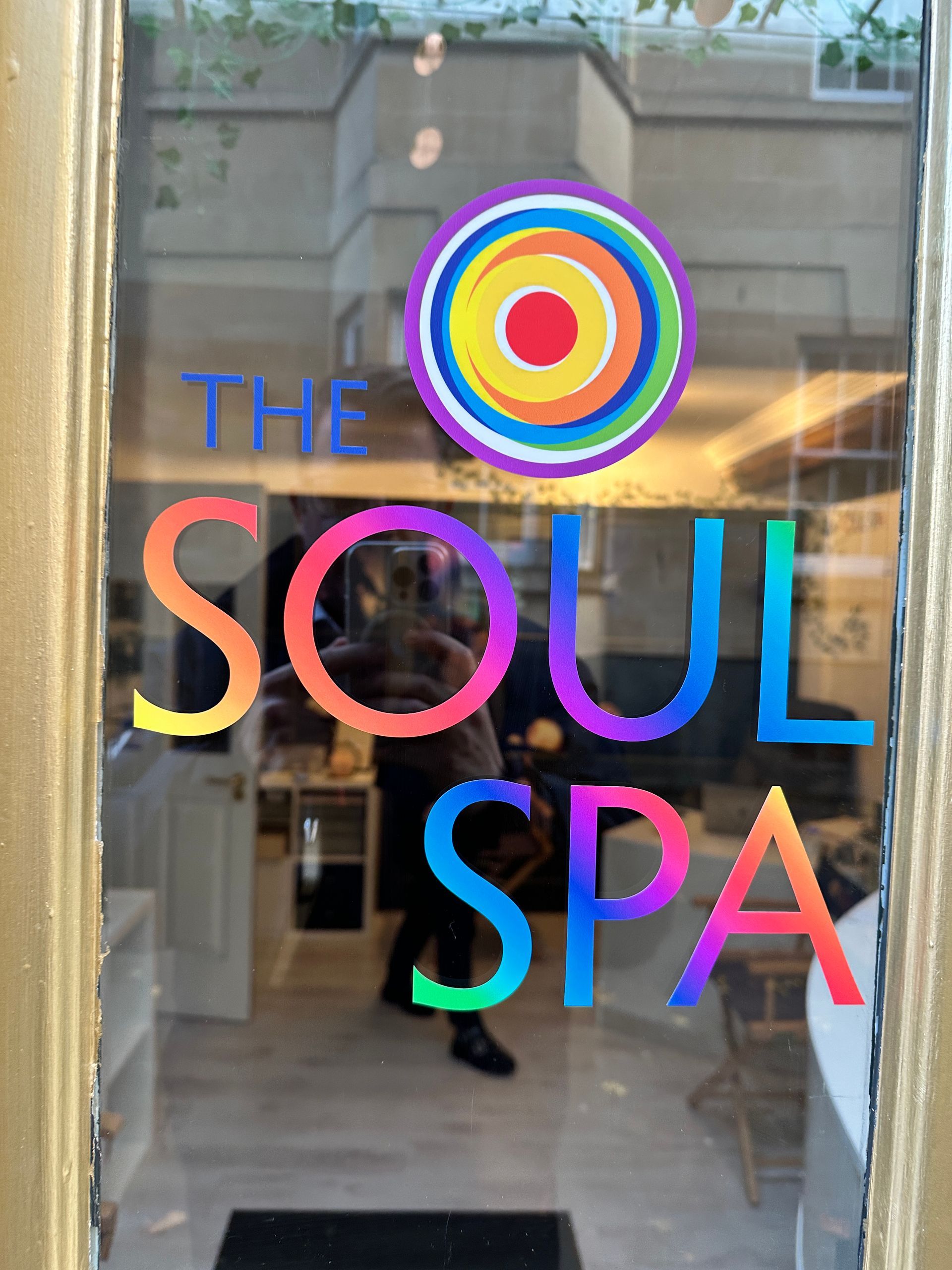 A colorful sign that says the soul spa on it