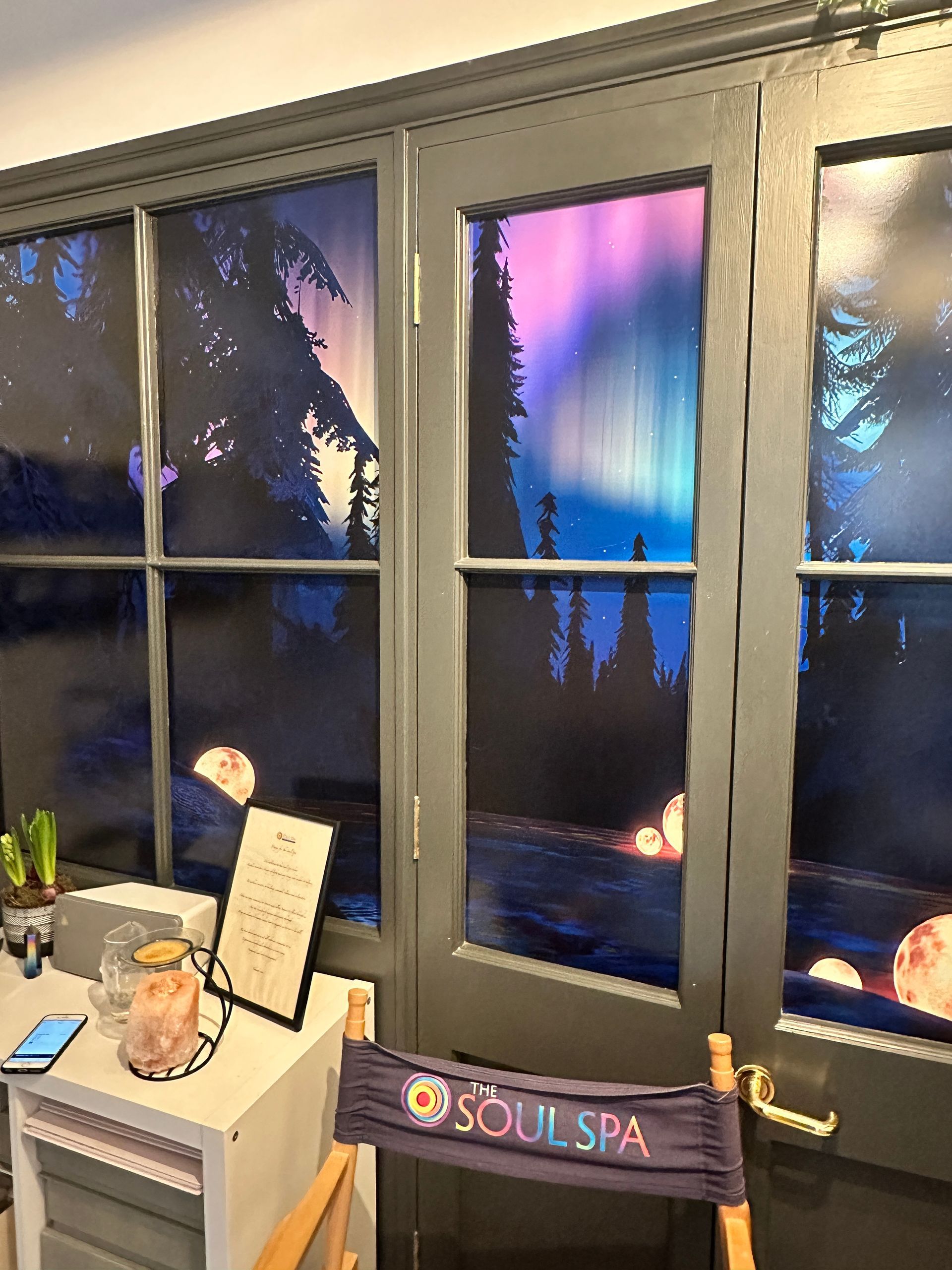 A chair with the word soul spa written on it