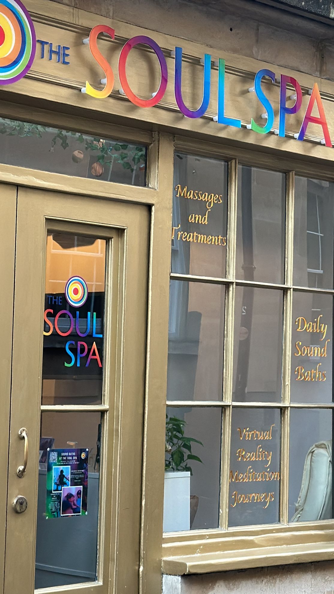 A store front with a sign that says the soul spa