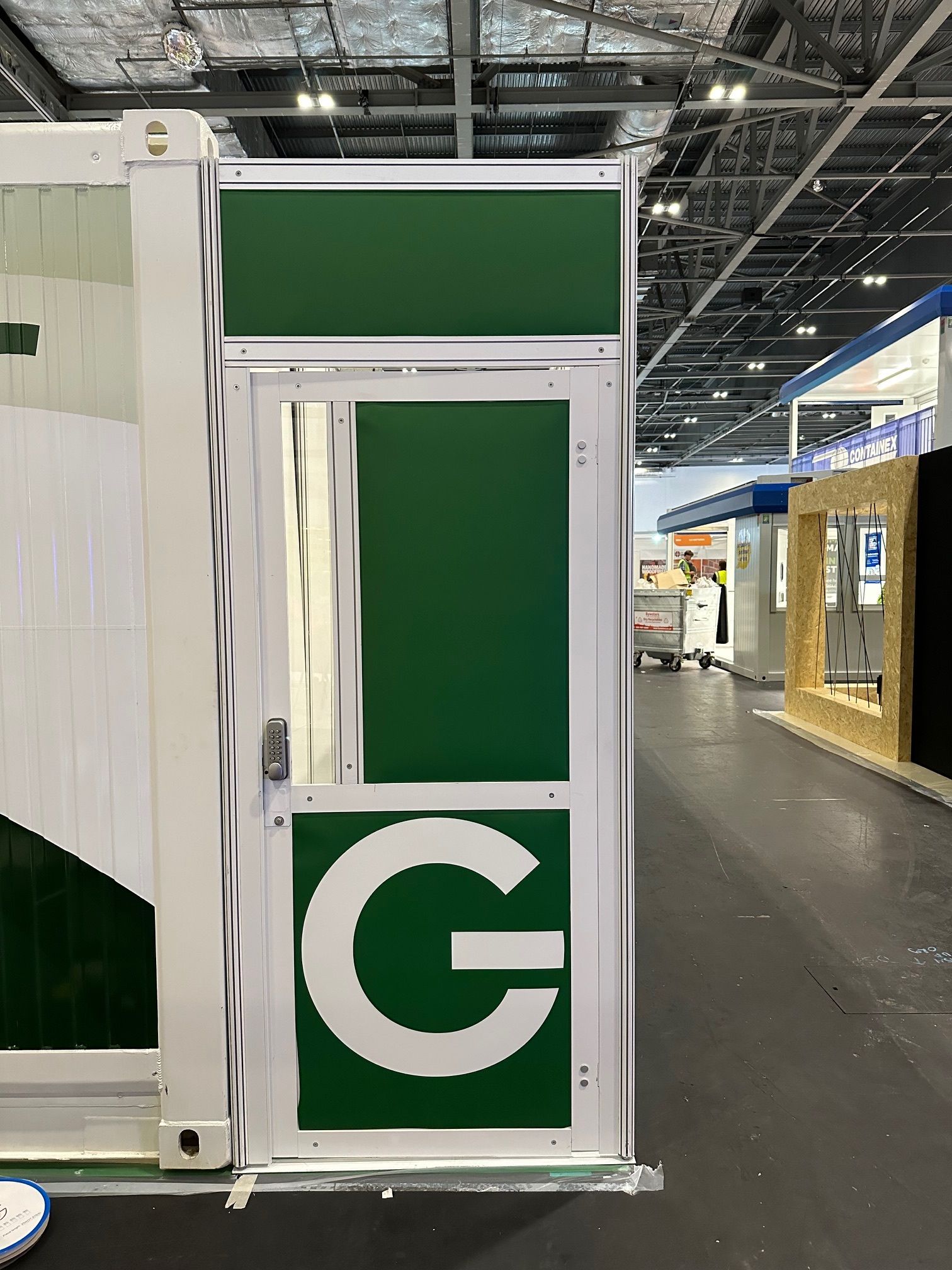 N3 Display Graphics | A green door with a white letter g on it.