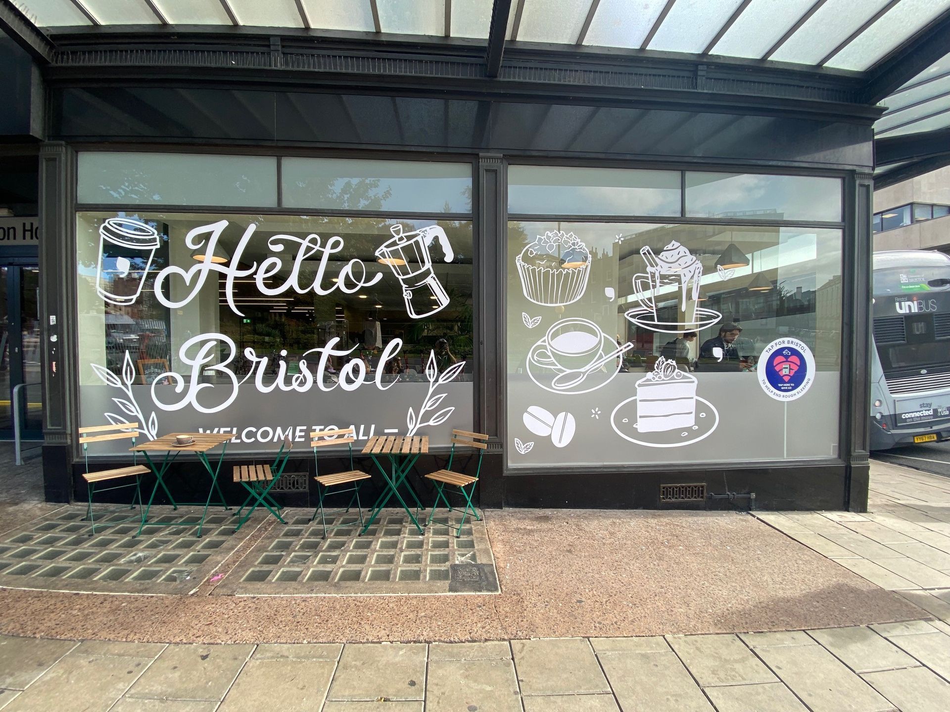 A store front with a sign that says `` hello bristol '' on it.