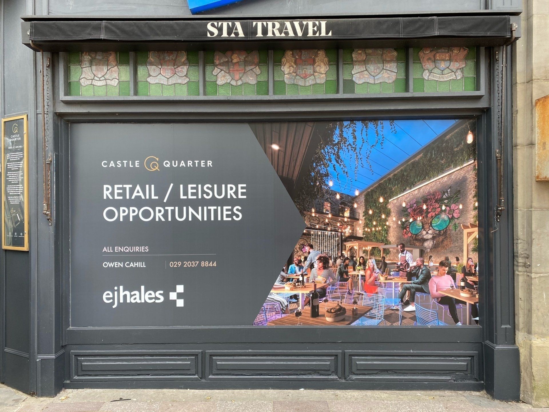 A store front with a sign on it that says `` retail / leisure opportunities ''.