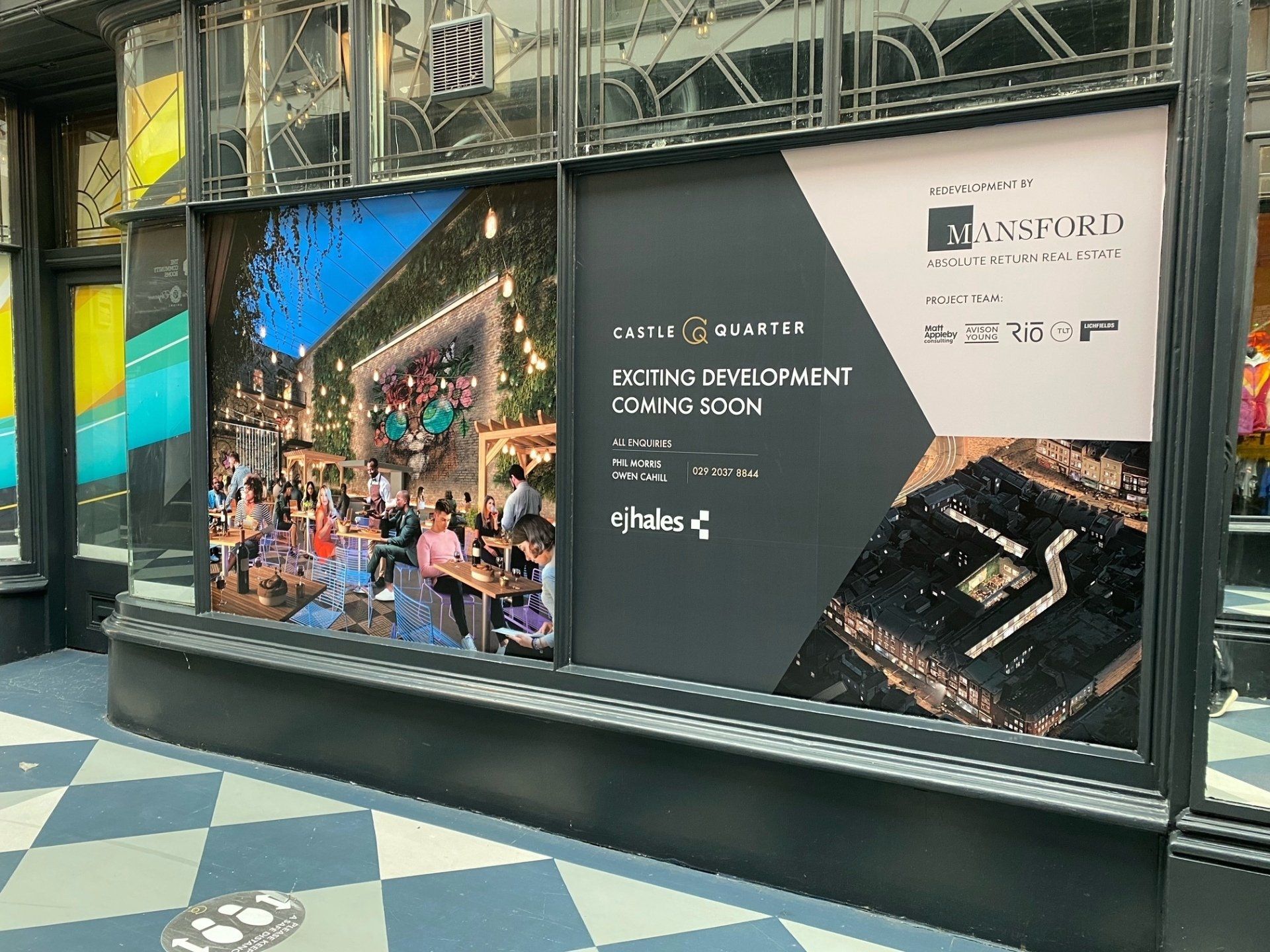 A building with a large advertisement on the side of it.