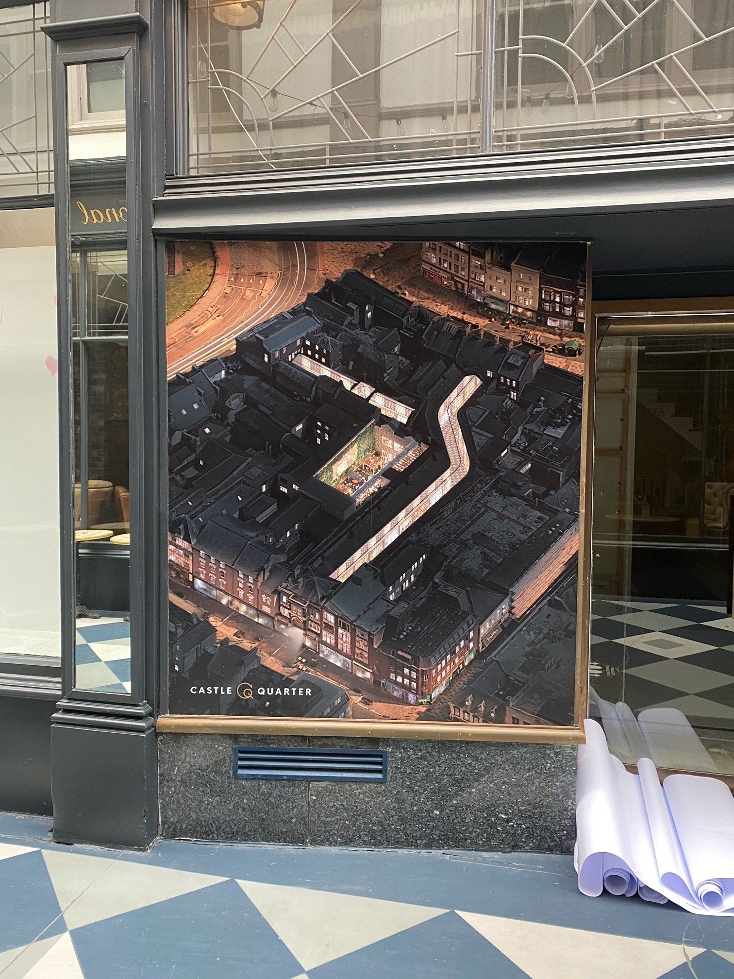 An aerial view of a building in a window
