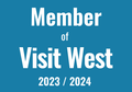 A blue sign that says member of visit west 2023 / 2024