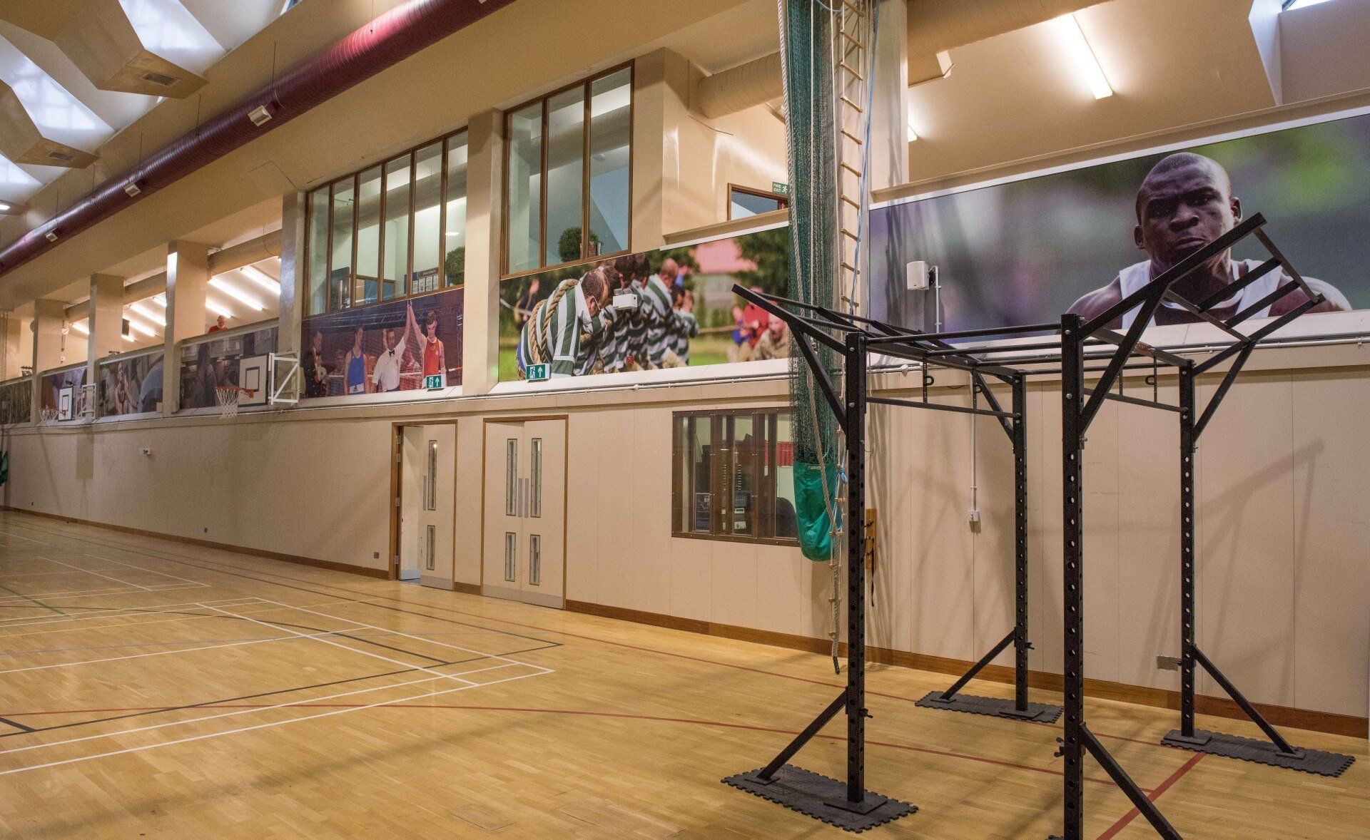 A gym with a picture of michael jordan on the wall.