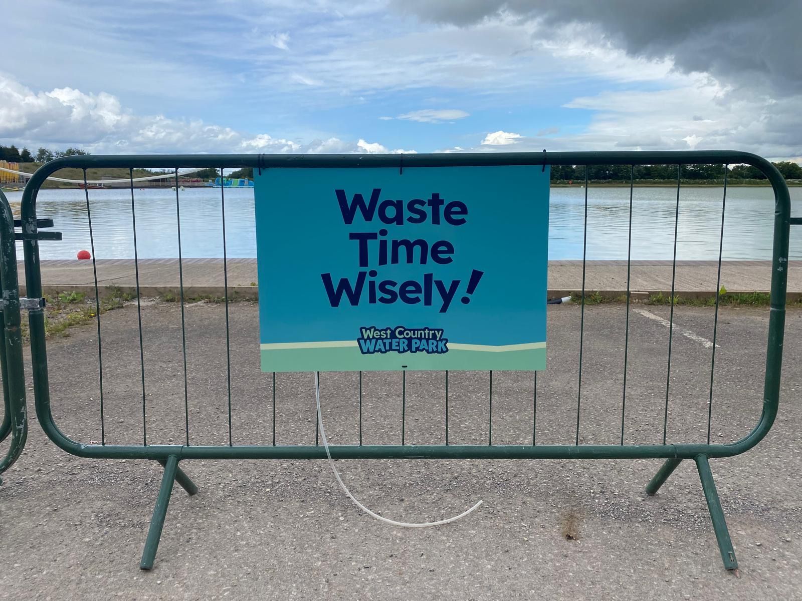 N3 Display Graphics | A sign on a fence that says waste time wisely