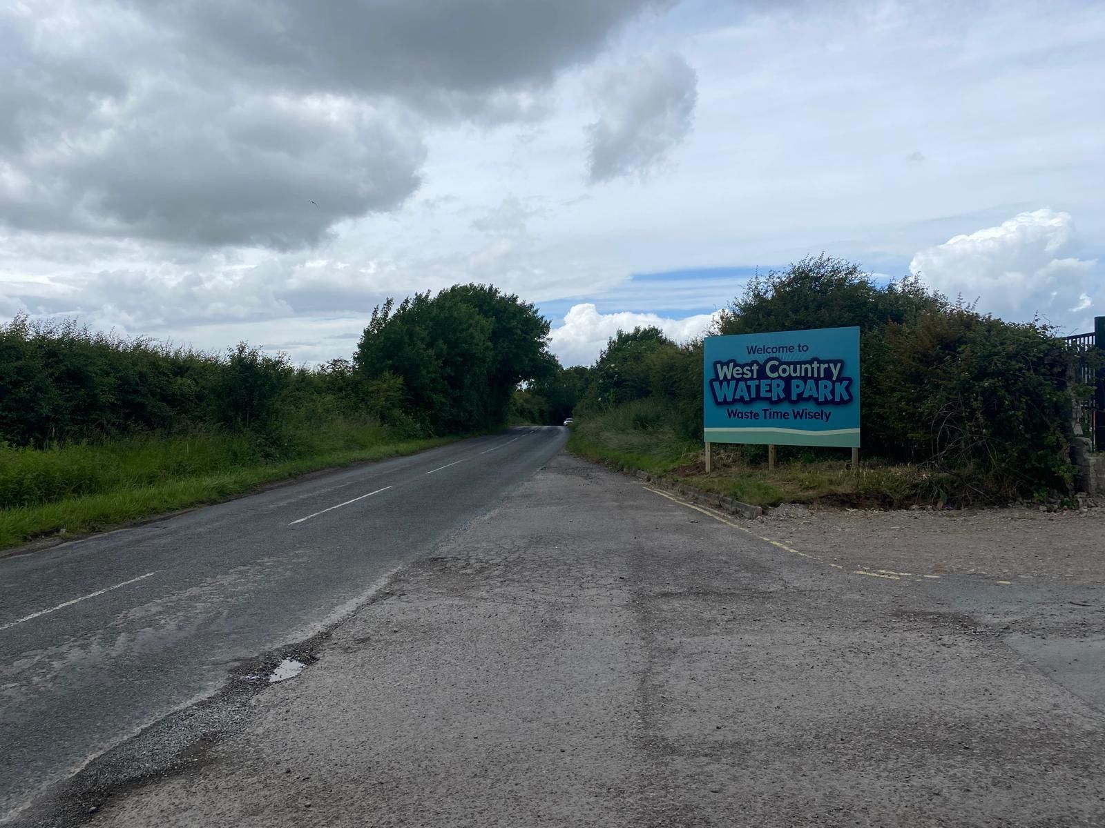 N3 Display Graphics | A road with a blue sign on the side of it.