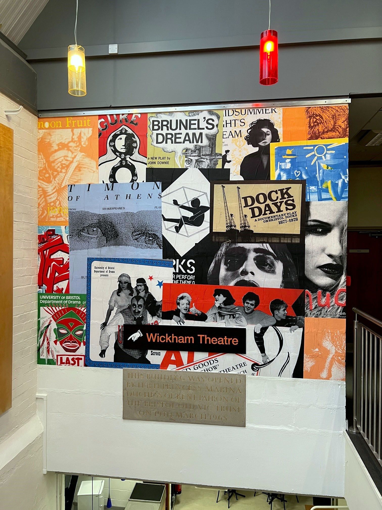 A wall with a lot of posters on it including one that says dock days