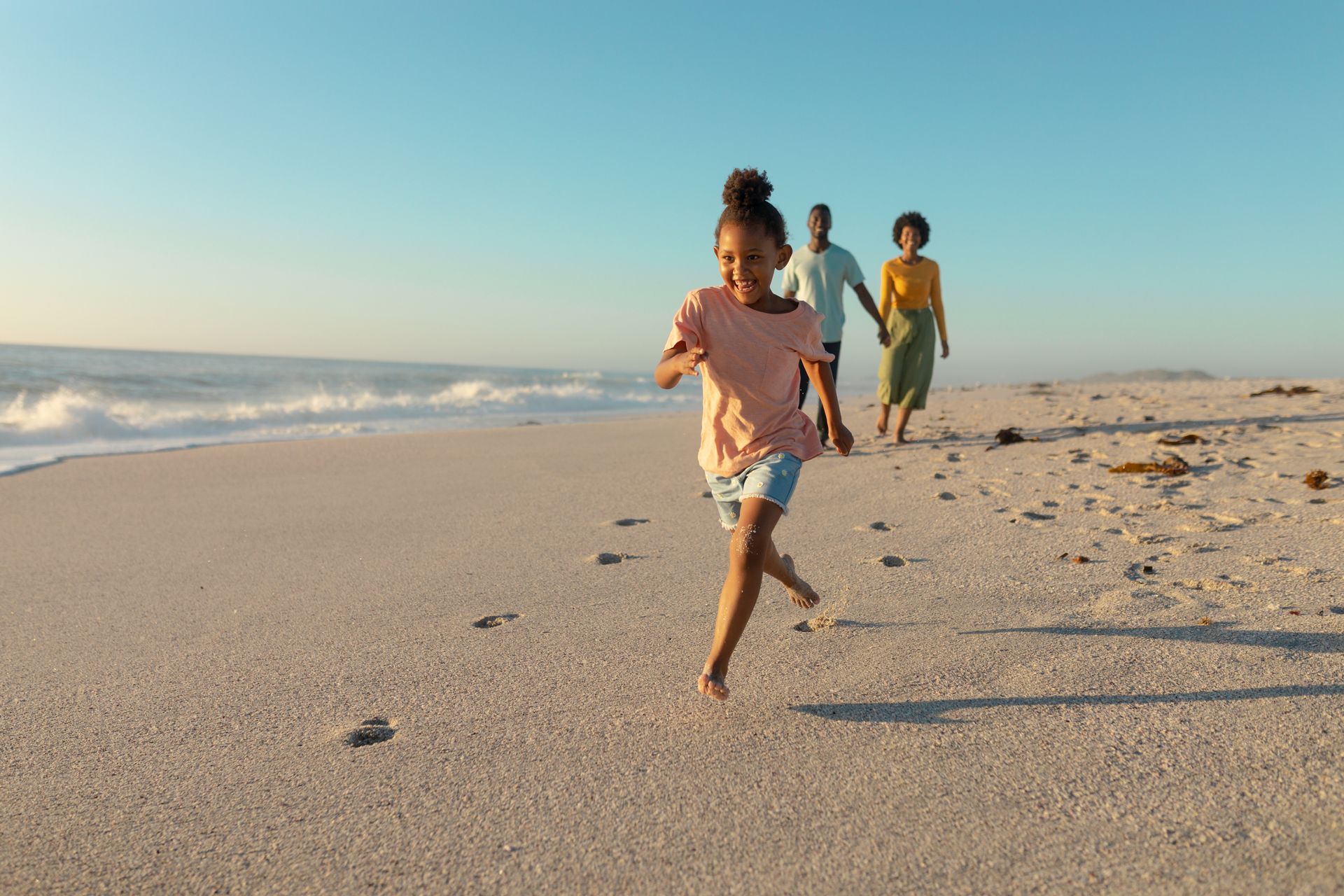 Girl running on beach