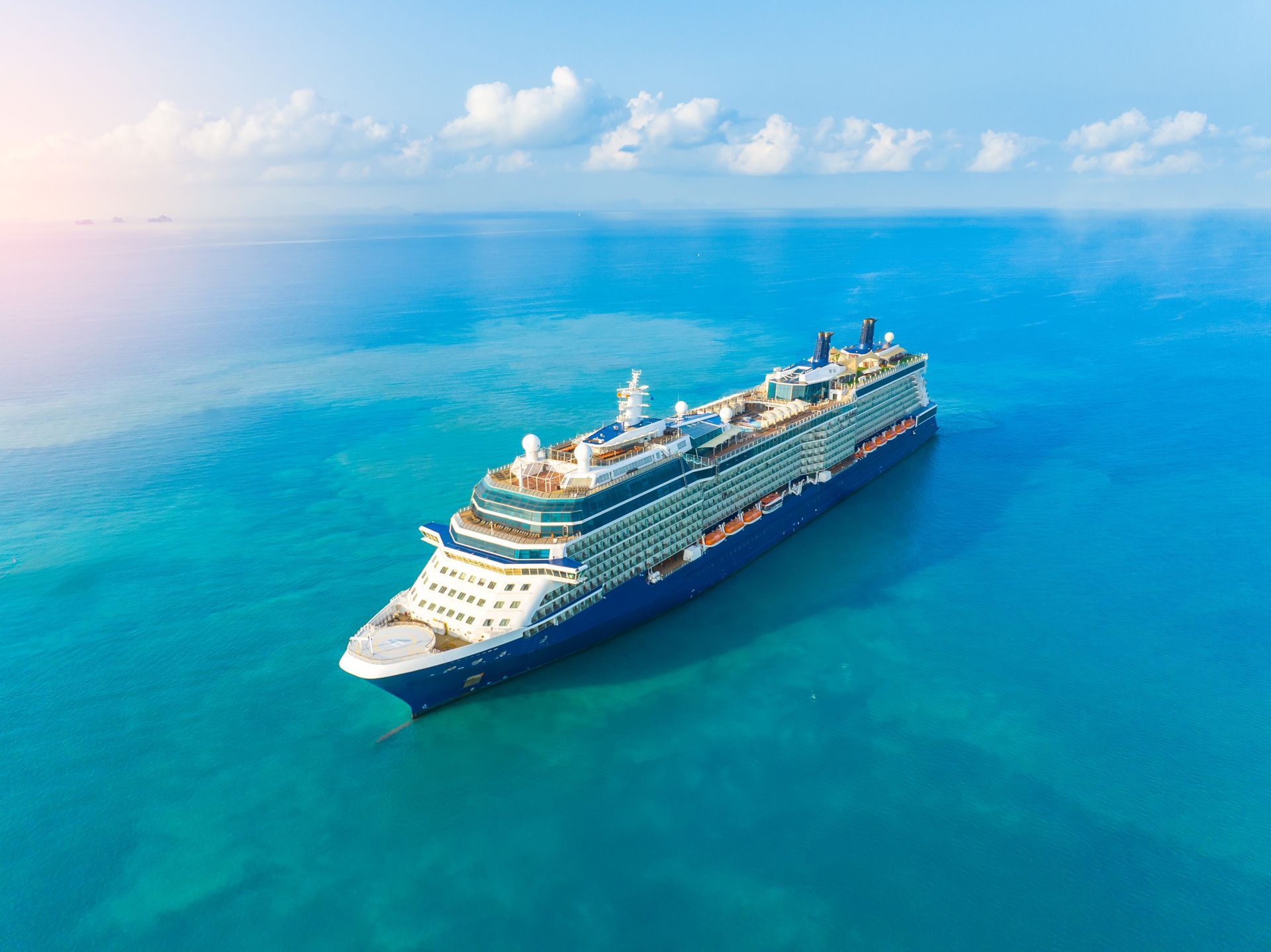 Cruise ship sailing on blue ocean water