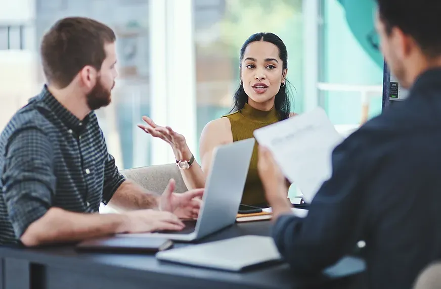 Person holding a phone displaying data with
