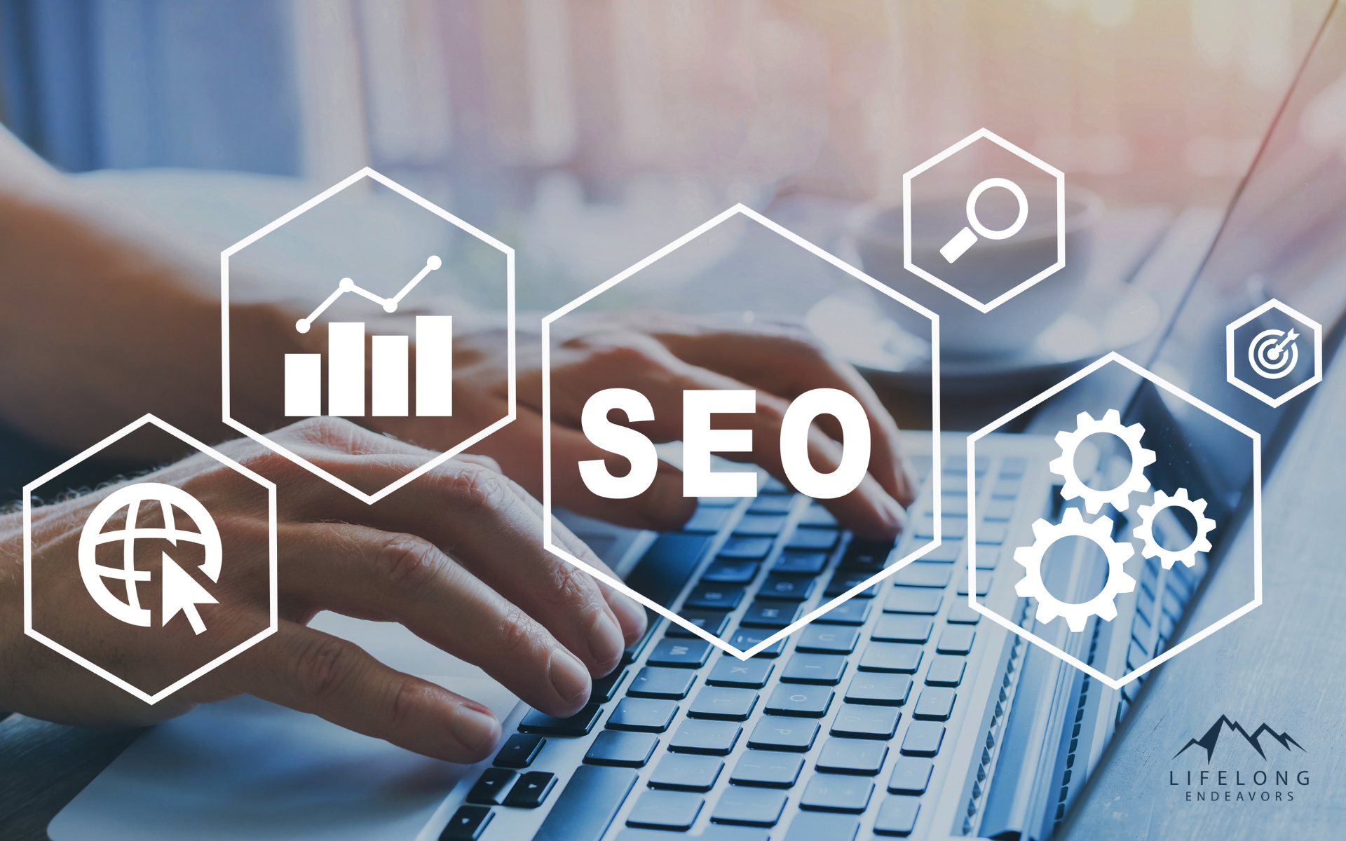 A person is typing on a laptop computer with the word seo surrounded by icons.