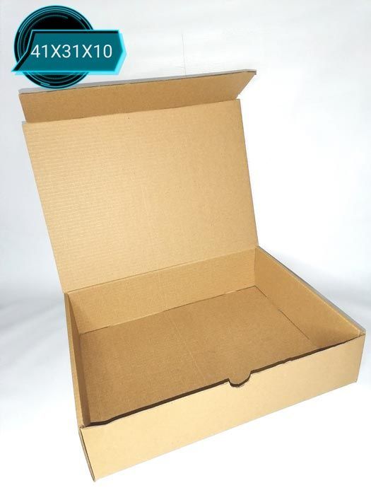 Una caja de cartón con la tapa abierta y una etiqueta que dice 41x31x10