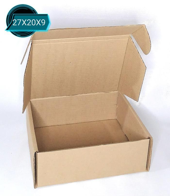 Una caja de cartón con la tapa abierta está colocada sobre una superficie blanca.