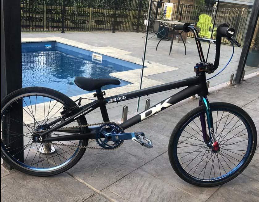 A Black BMX Bike Is Parked In Front Of A Pool — Active Cycles In Raymond Terrace, NSW