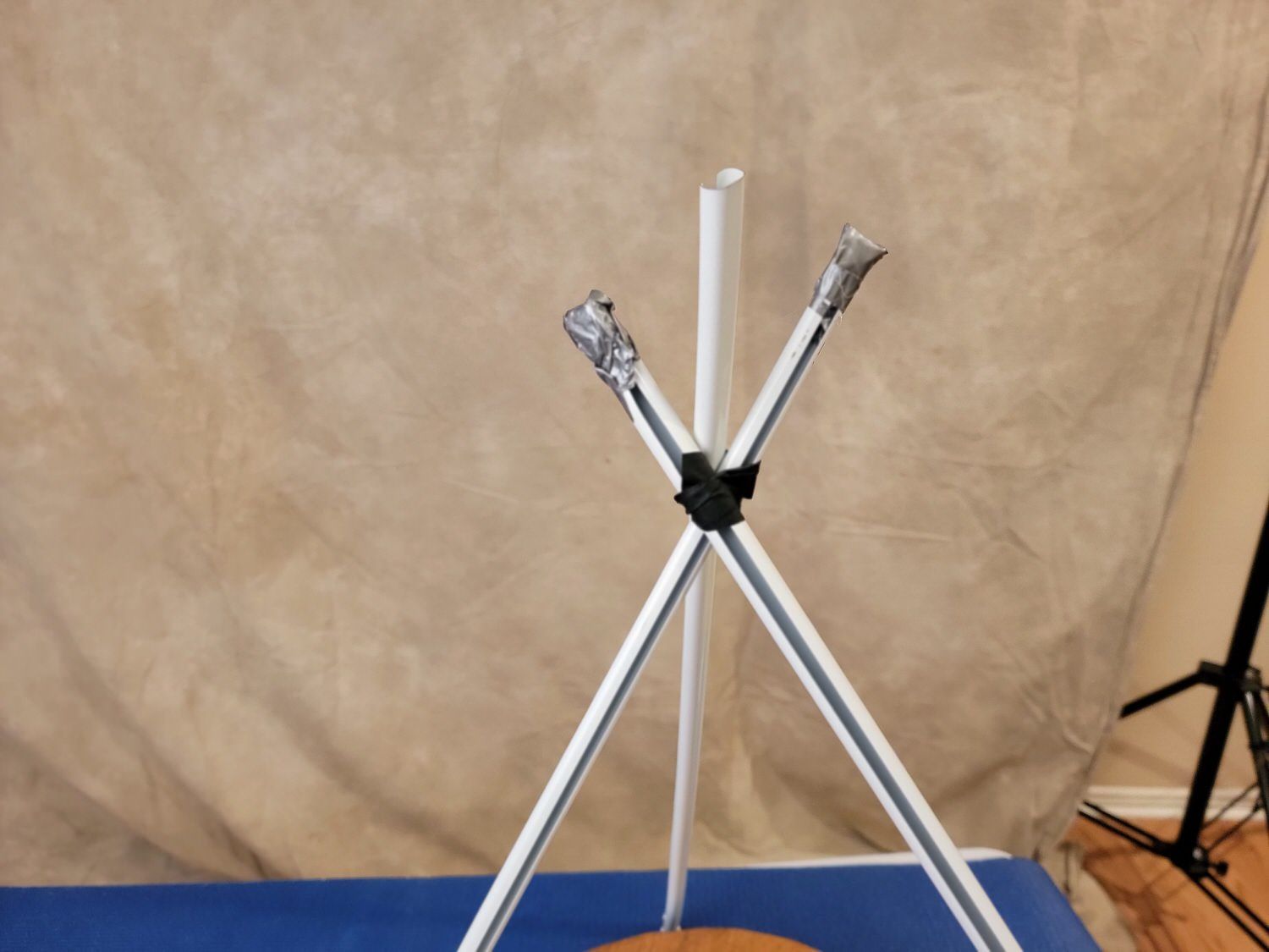 Step 3 of making  a boho newborn tent out of metal rod