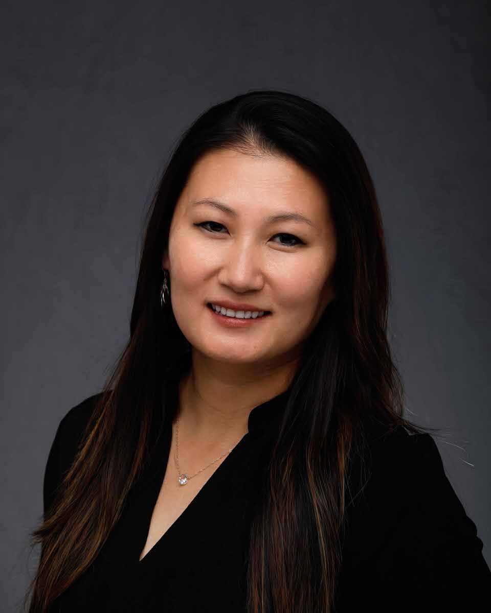 Young corporate Asian woman