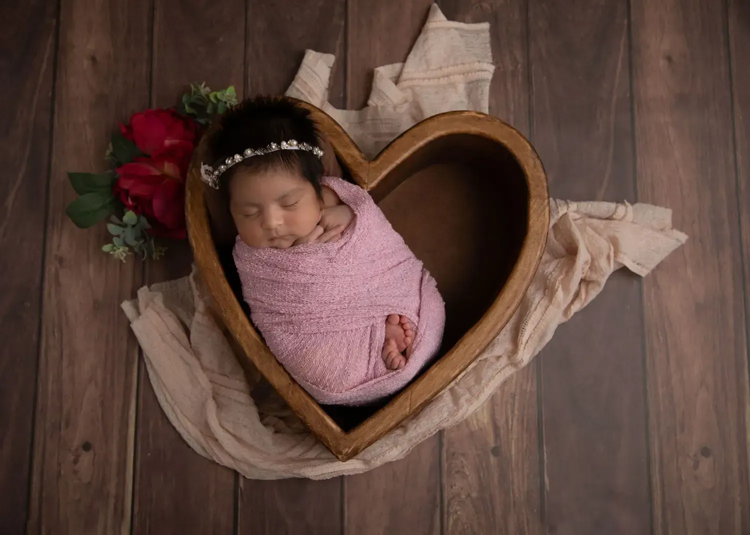 Glendale Newborn girl in heart shaped bowl