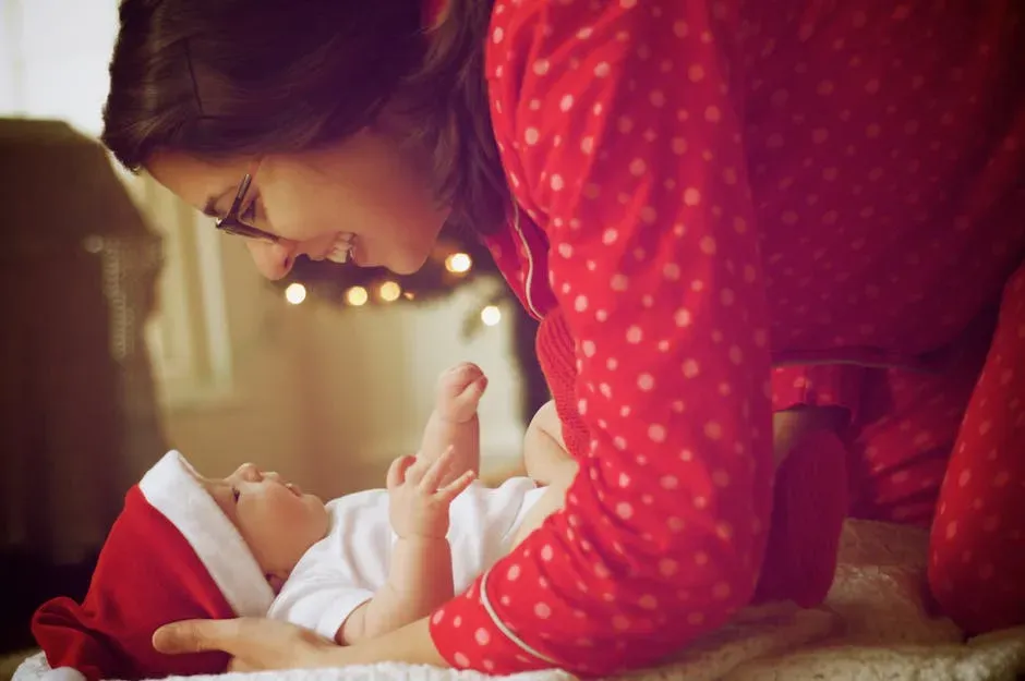 Lifetstyle, casual maternity portrait of woman with baby in her home.