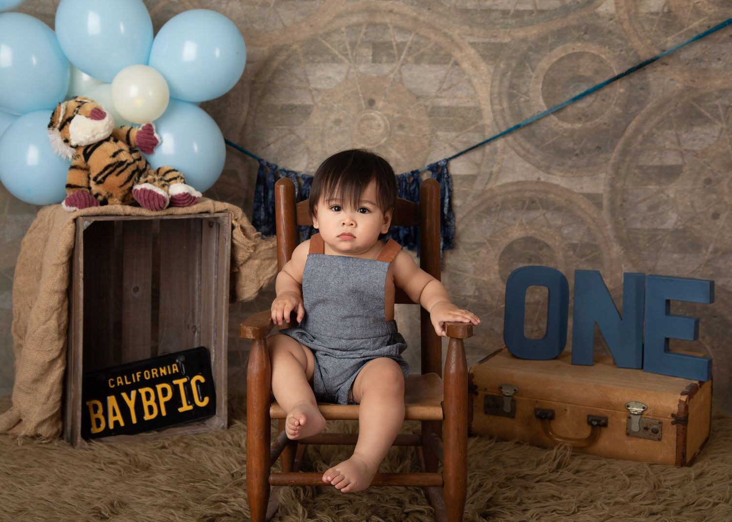 Baby boy in child rocking chair
