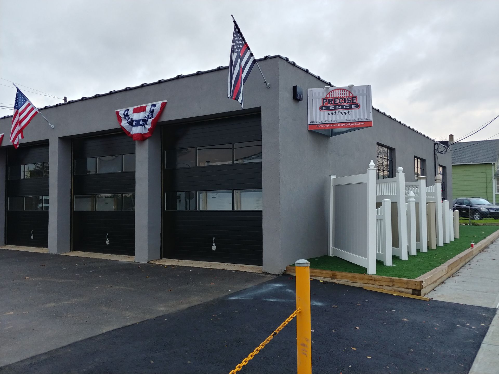 A building with a sign that says ' acura ' on it