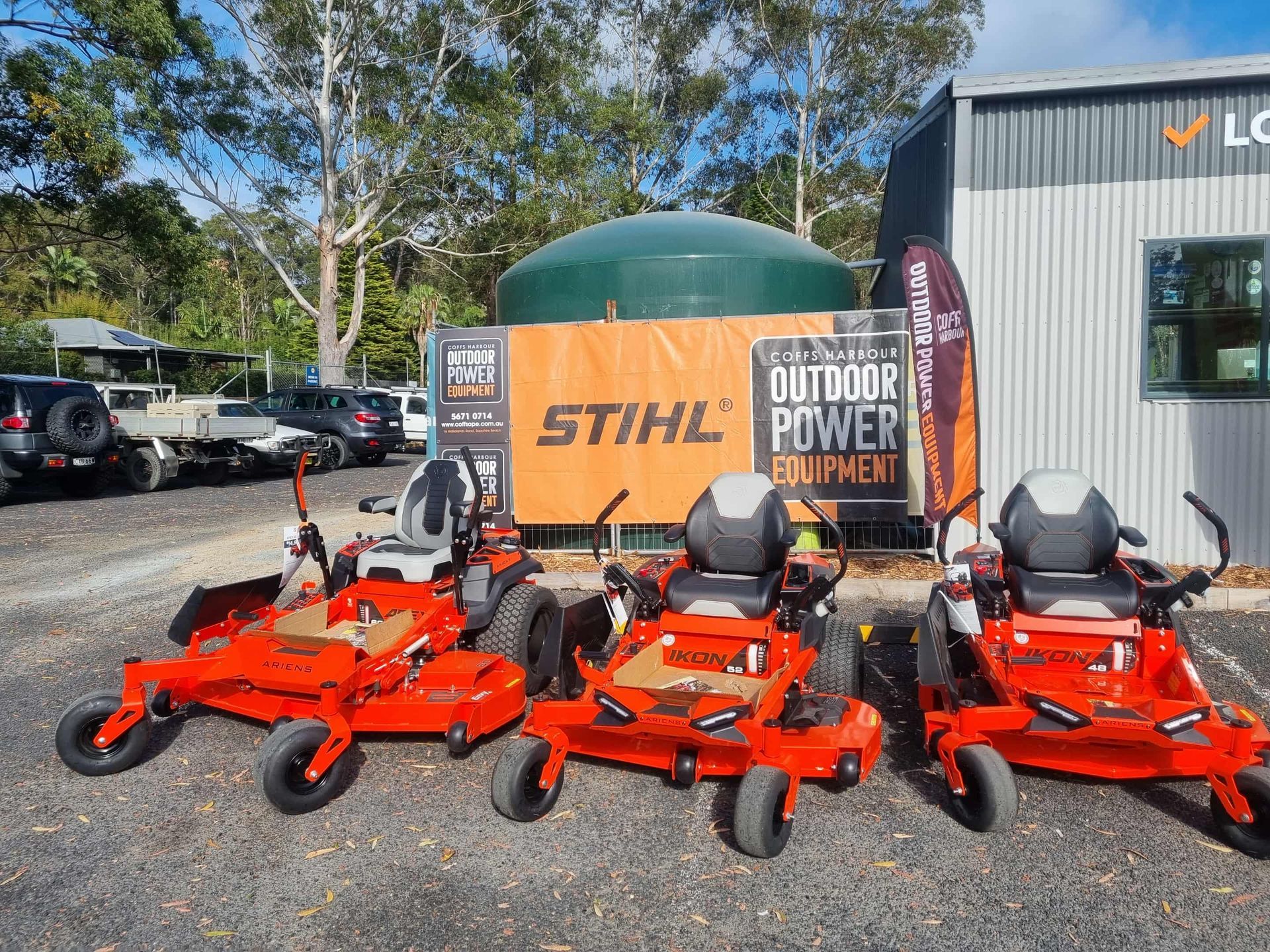Three Orange Zero-turn Mowers Displayed Outside A Store — Urunga Chainsaw and Mower in Urunga, NSW