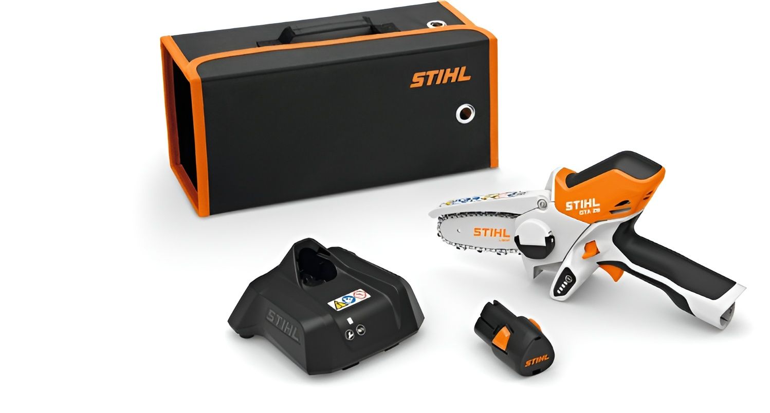 A STIHL Chainsaw With a Charger and a Case — Urunga Chainsaw and Mower in Mid North Coast, NSW