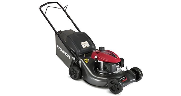 A Honda Lawn Mower is Sitting on a White Surface — Urunga Chainsaw and Mower in Urunga, NSW