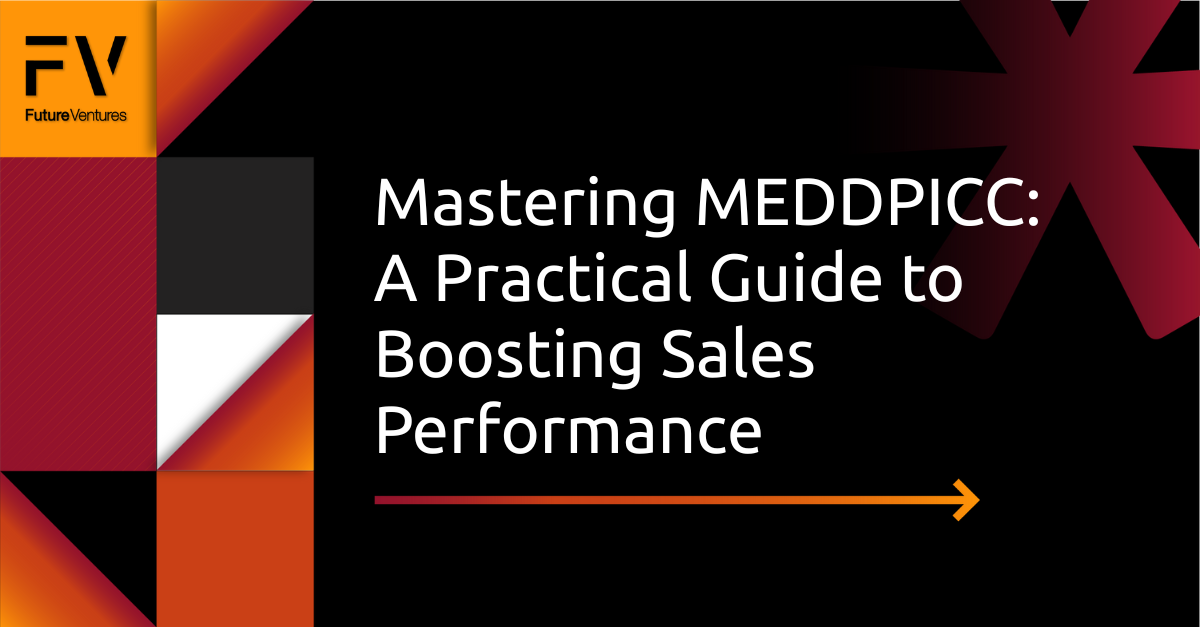 A woman sits in front of a computer monitor displaying a graph.