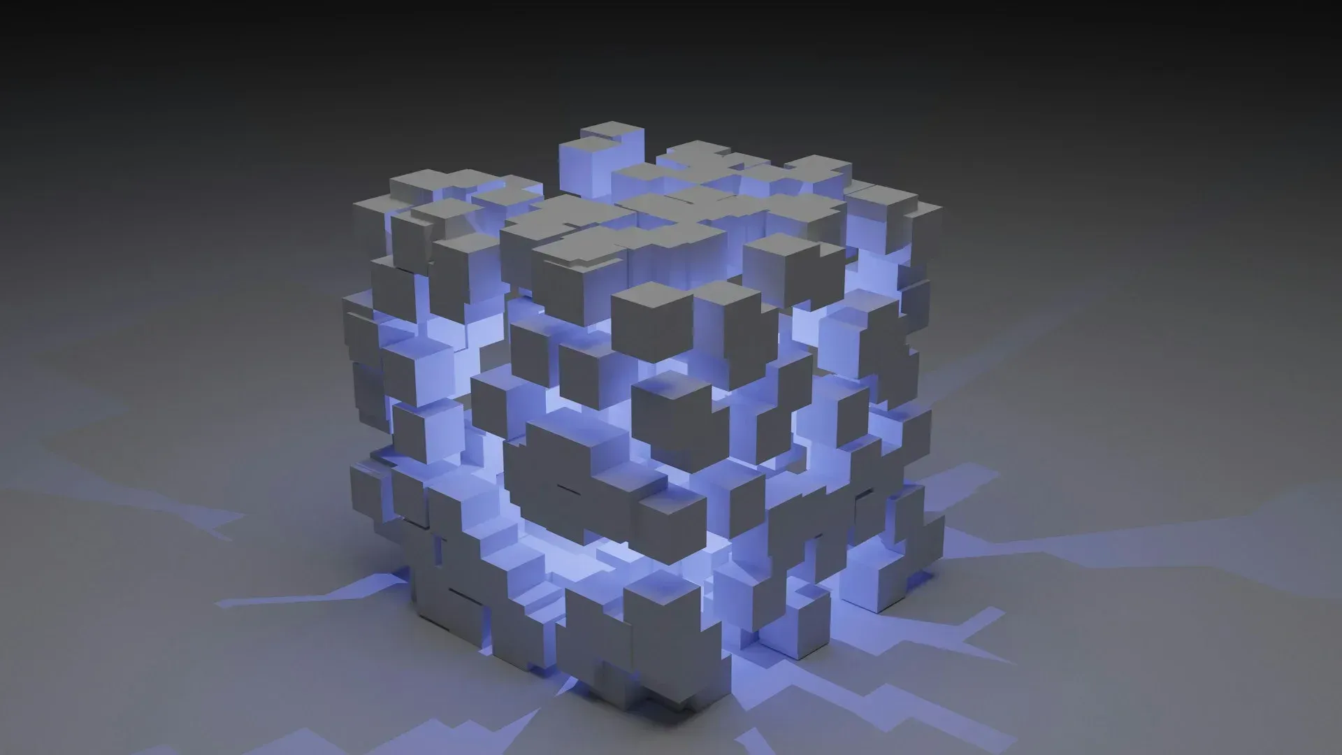Glowing blue cube, deconstructed with scattered white blocks, casting light on a gray surface.