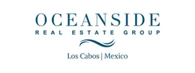 Oceanside Real Estate Group logo with blue text and wave.