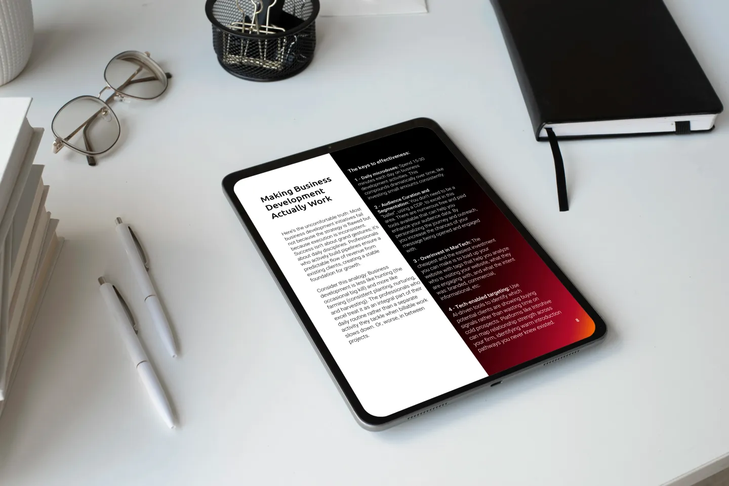 Smart Business Development e-Book Inside on a tablet laying down on a desk