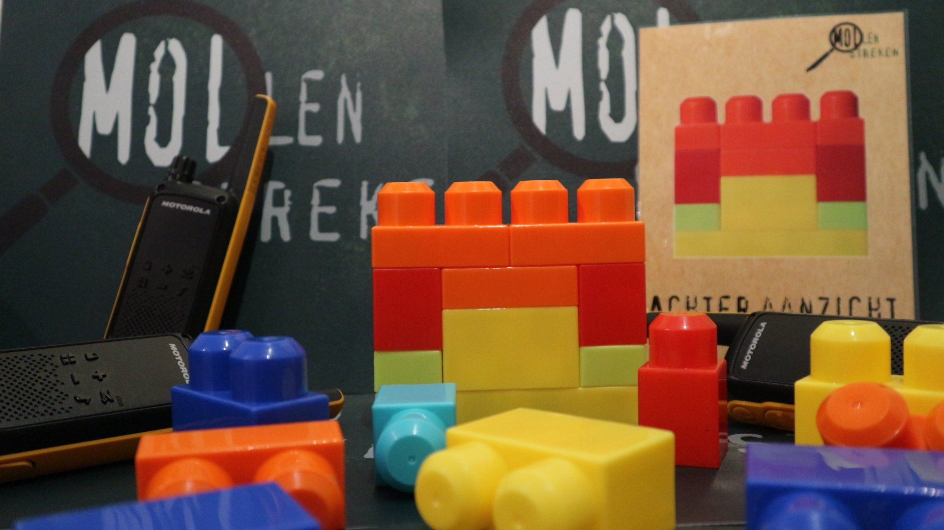 Een krijtbord met het woord molzen erop