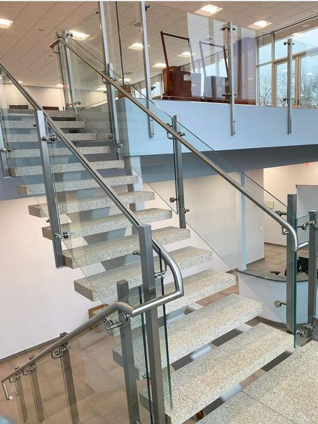 Interior glass commercial stair and railing | Steel Stairs | American Iron Works | New Haven CT