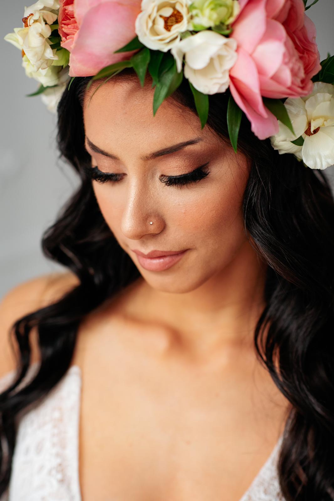 woman wearing professional makeup and flower crown
