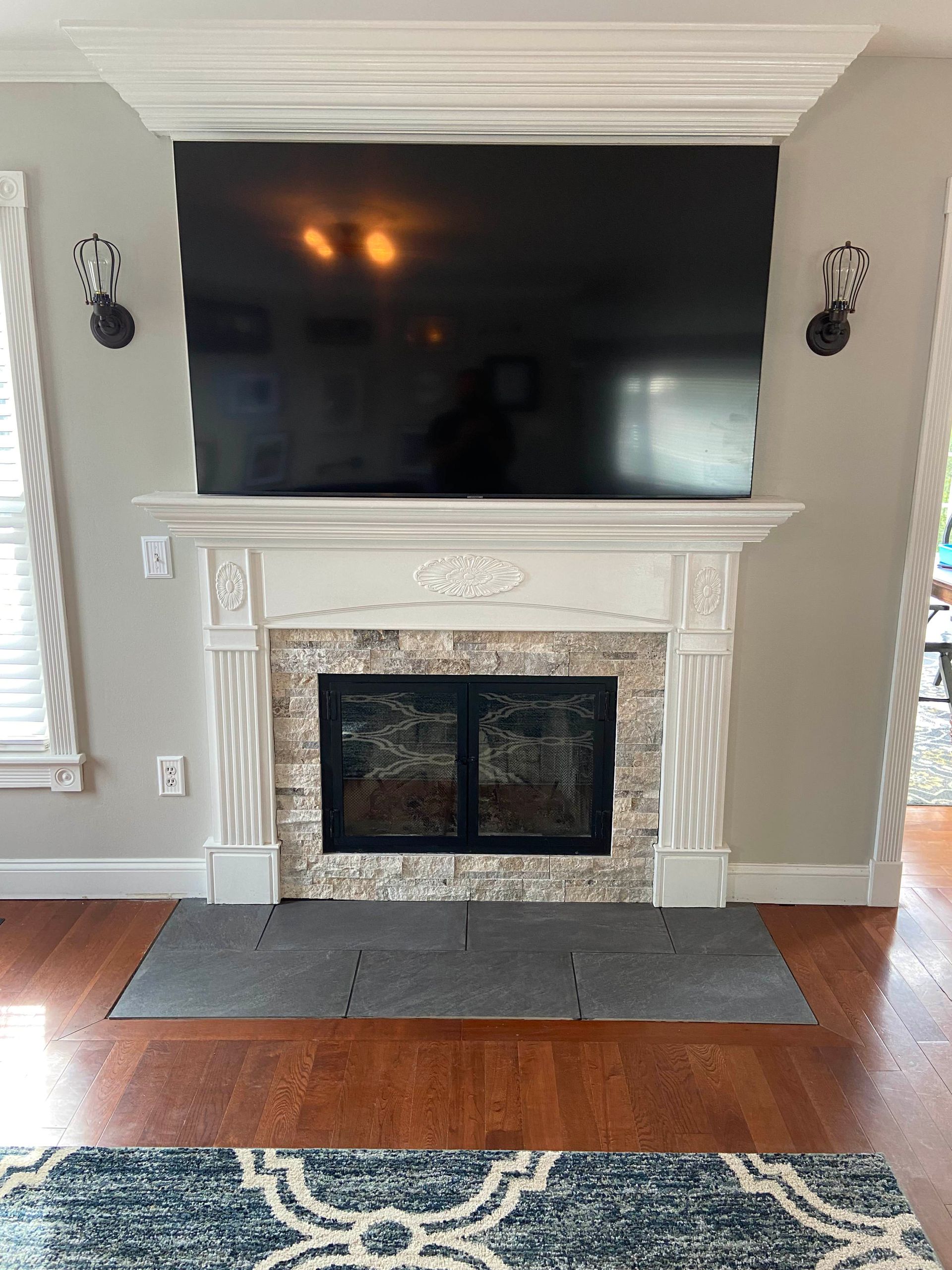 A floor being leveled with a spiked roller.